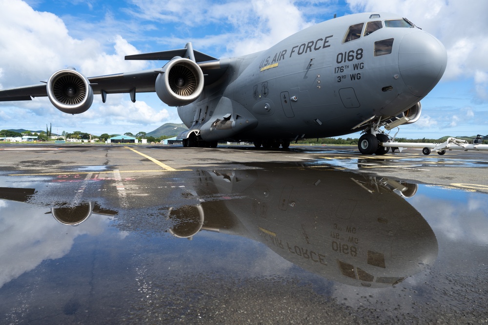 JBER aircrew, French Army work together to load Puma helicopter onto C-17