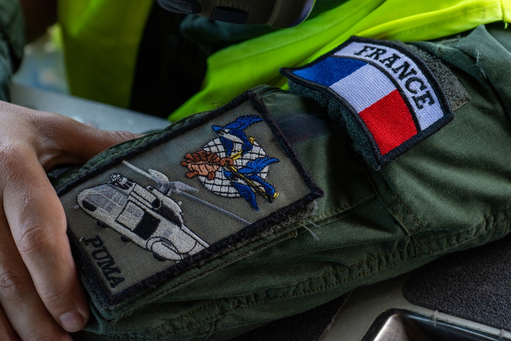 JBER aircrew, French Army work together to load Puma helicopter onto C-17