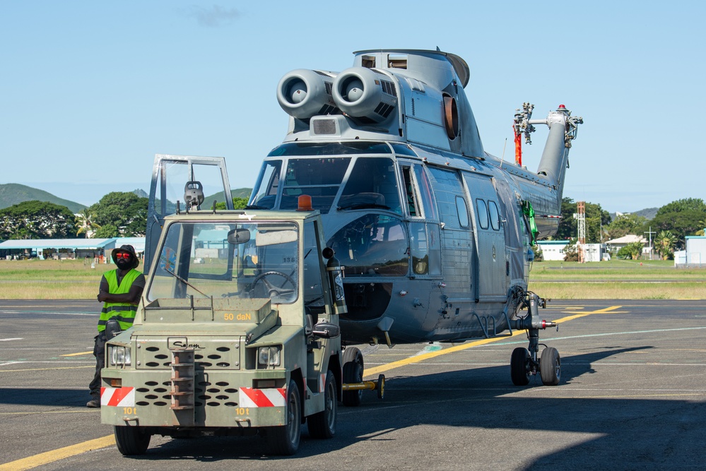 JBER aircrew, French Army work together to load Puma helicopter onto C-17