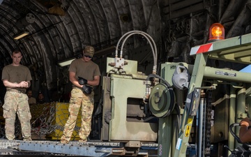 JBER aircrew, French Army work together to unload Puma from C-17