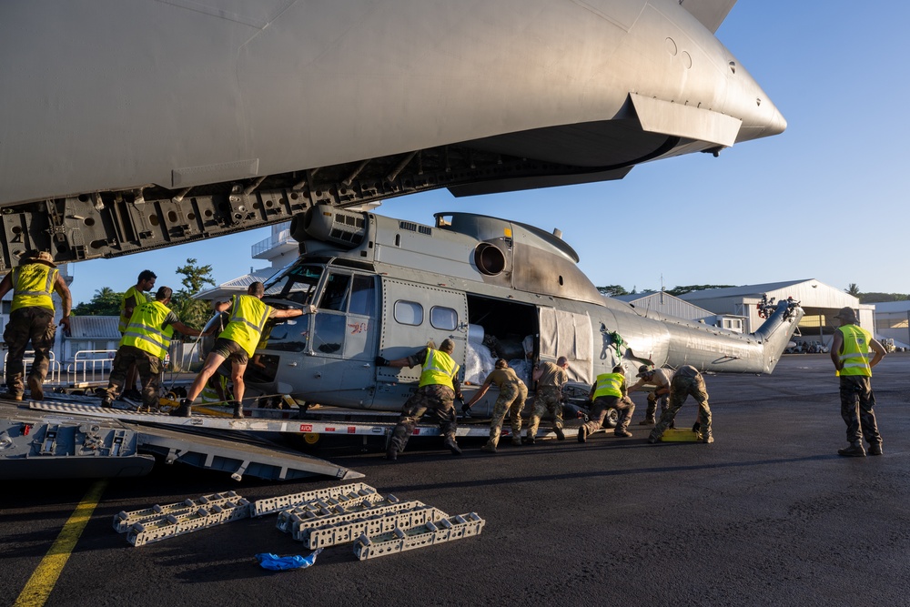 JBER aircrew, French Army work together to unload Puma from C-17