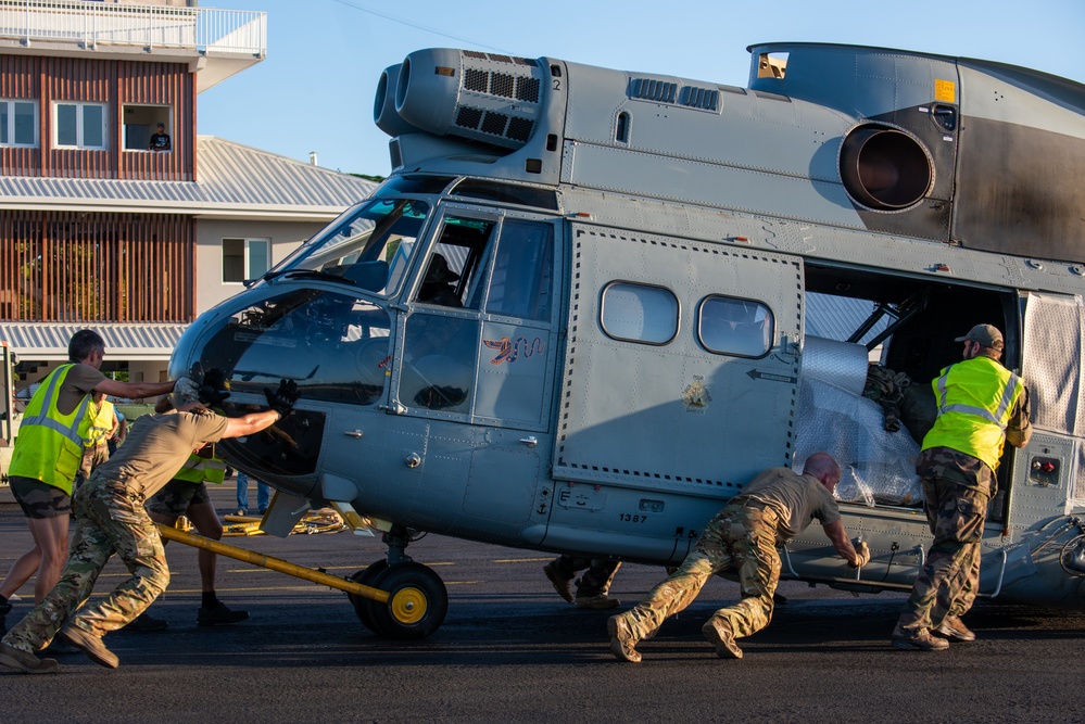 JBER aircrew, French Army work together to unload Puma from C-17