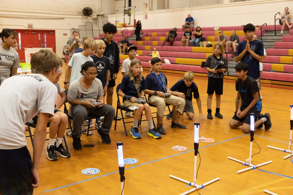 Flight of the Drones: Middle Schoolers Soar in Drone Competition