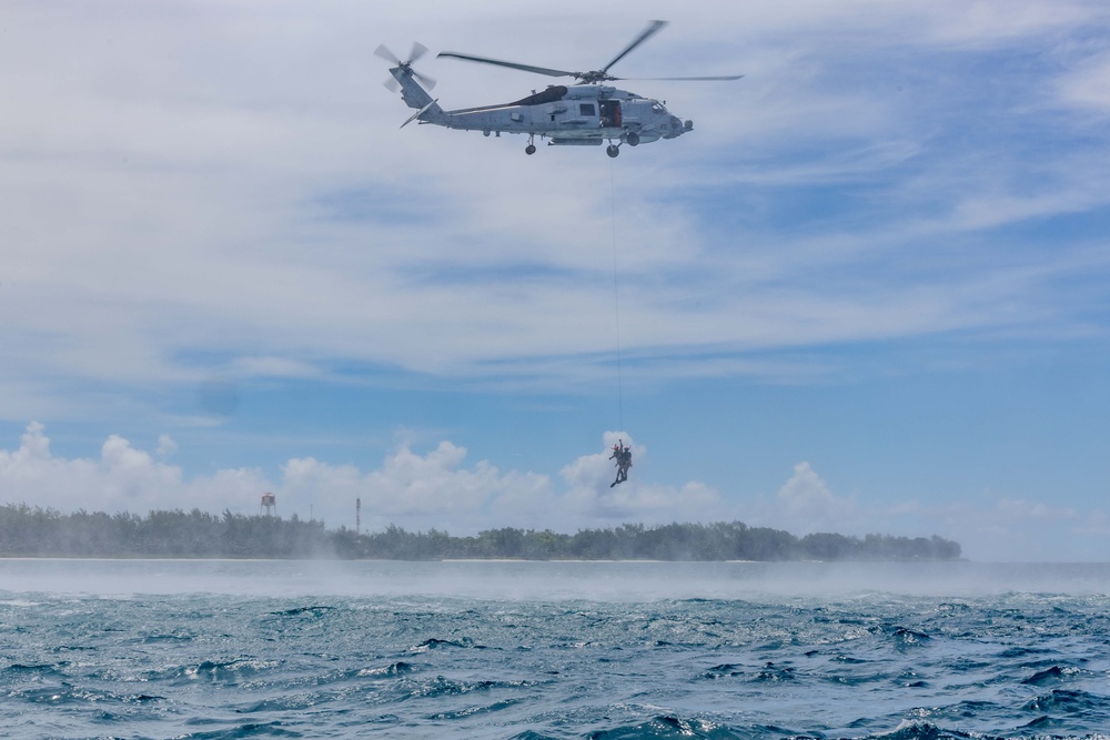 Search and Rescue Swimmers from HSM 49 det. 4 Practice Jumps off the Coast of Diego Garcia