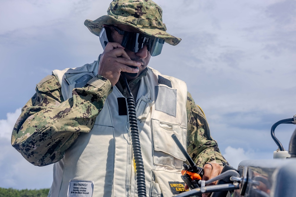 Search and Rescue Swimmers from HSM 49 det. 4 Practice Jumps off the Coast of Diego Garcia