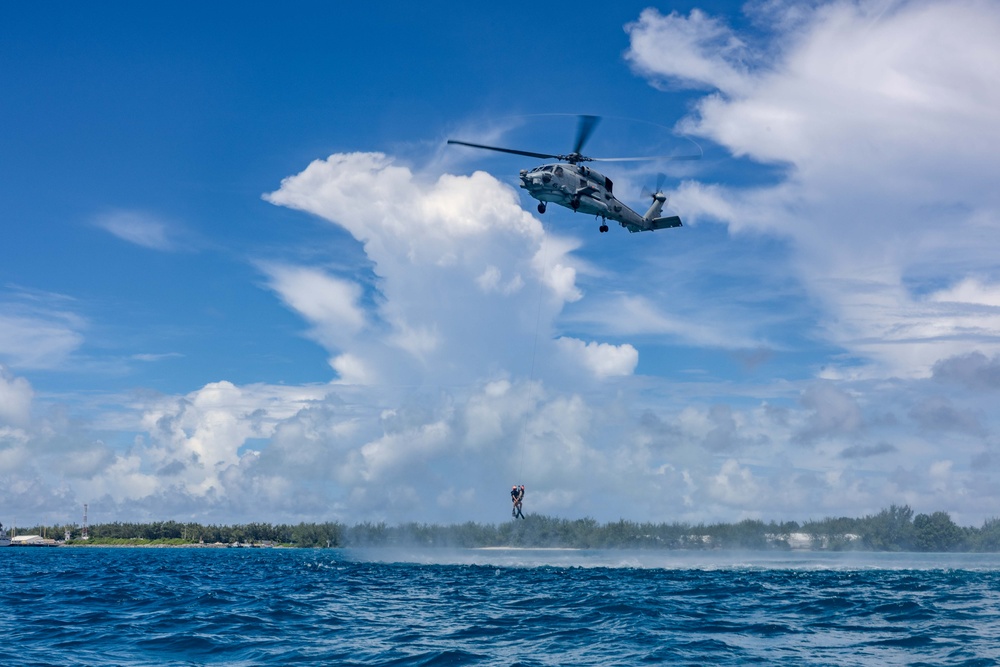 Search and Rescue Swimmers from HSM 49 det. 4 Practice Jumps off the Coast of Diego Garcia