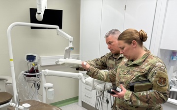 Master Sgt Ashley Malone and Maj. Rolf Osteraas conducting an illumination survey in the Landstuhl Specialty Dental Clinic