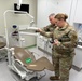 Master Sgt Ashley Malone and Maj. Rolf Osteraas conducting an illumination survey in the Landstuhl Specialty Dental Clinic