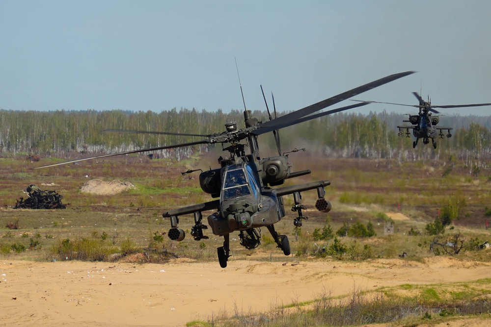 U.S. Army AH-64 Apaches roar through Latvia demonstrating lethality