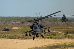 U.S. Army AH-64 Apaches roar through Latvia demonstrating lethality