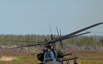 U..S. Army AH-64 Apaches roar through Latvia demonstrating lethality