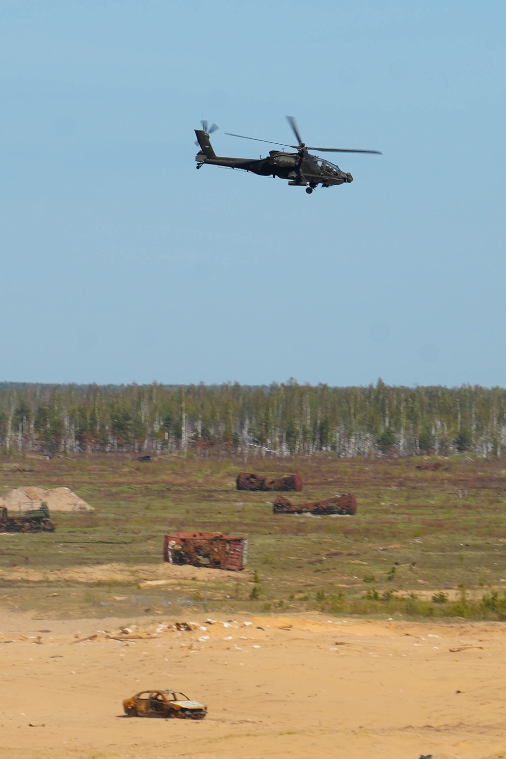 U.S. Army AH-64 Apaches roar through Latvia demonstrating lethality