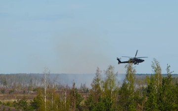U.S. Army AH-64 Apaches Roar through Latvia demonstrating Lethality