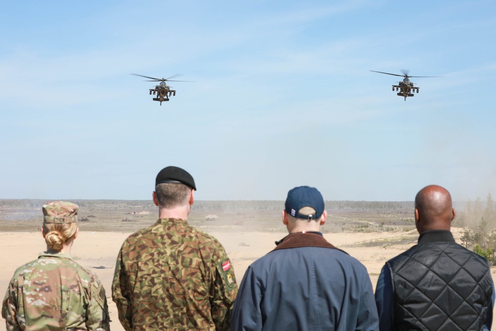 U.S. Army AH-64 Apaches roar through Latvia demonstrating lethality