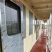 Dredge Potter maintenance to cover windows and replace galley door.