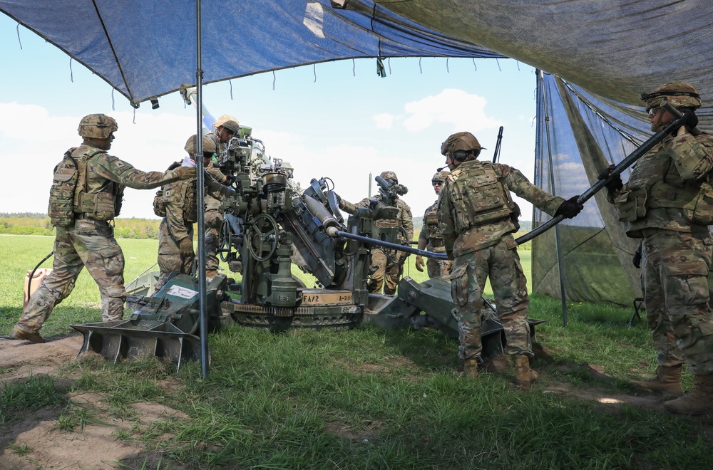 2CR Soldiers conduct Table VI qualification on an M777A2 medium towed Howitzer