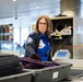 Officer performing the duties of a Transportation Security Officer on a TSA Checkpoint