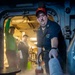 Nimitz Sailor Demonstrates A Fire Extinguisher Agent Test During General Quarters Drill