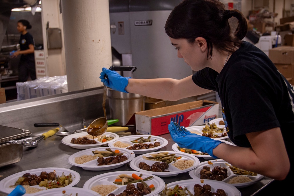 Nimitz Sailor Prepares Galley Food