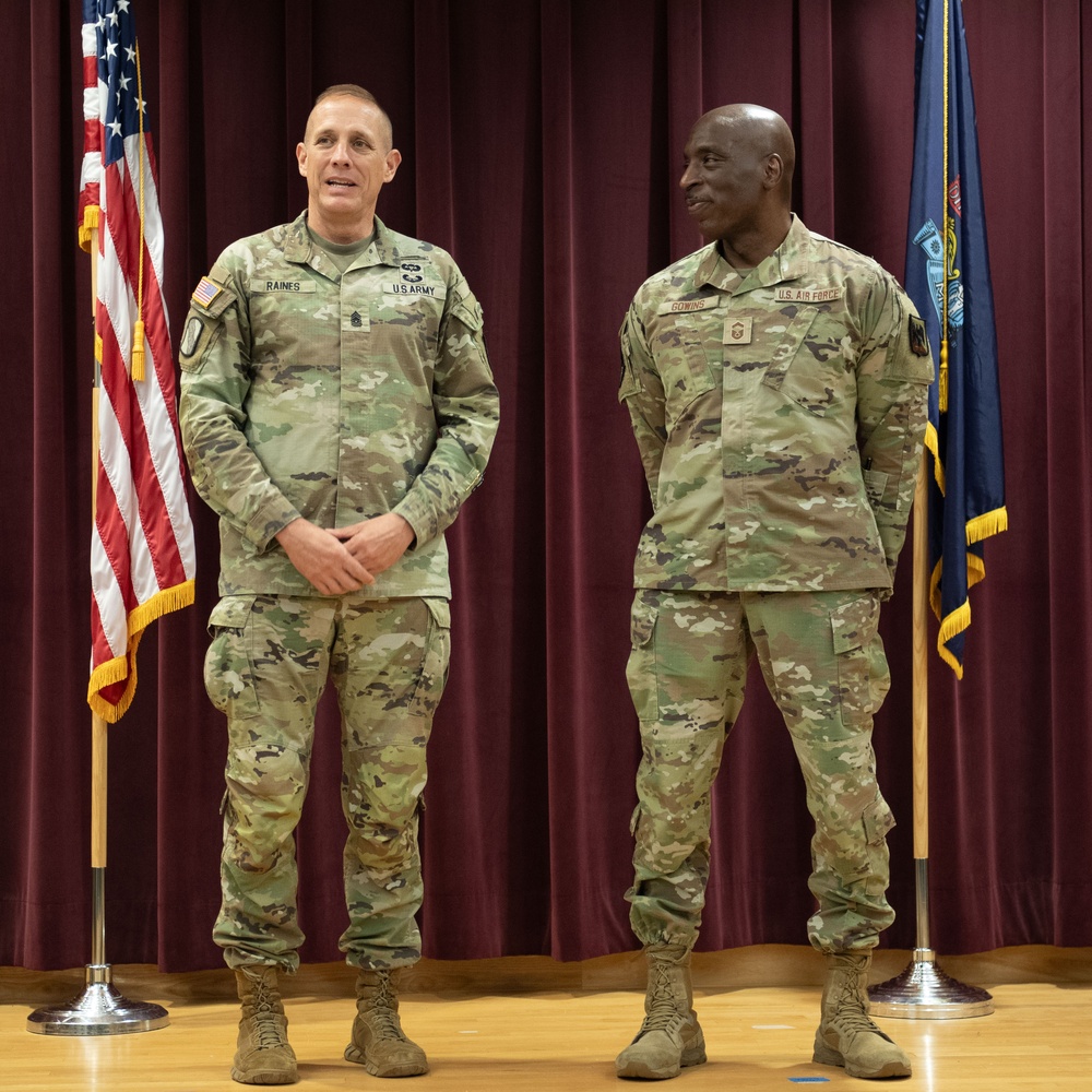Senior Enlisted Advisor to the Chief of the National Guard Bureau, John Raines, Recognizes the Accomplishments of Newly Promoted CMSgt Kenneth Gowins
