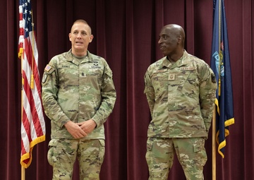 Senior Enlisted Advisor to the Chief of the National Guard Bureau, John Raines, Recognizes the Accomplishments of Newly Promoted CMSgt Kenneth Gowins