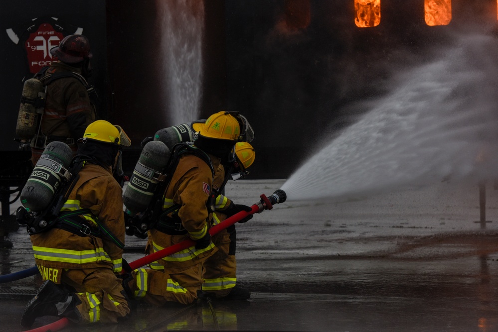 180FW Fire Protection Fights The Flames During Training Exercise