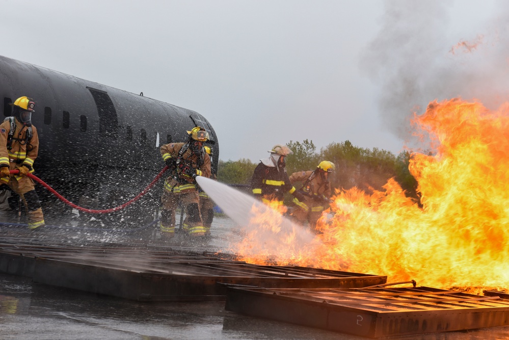 180FW Fire Protection Fights The Flames During Training Exercise