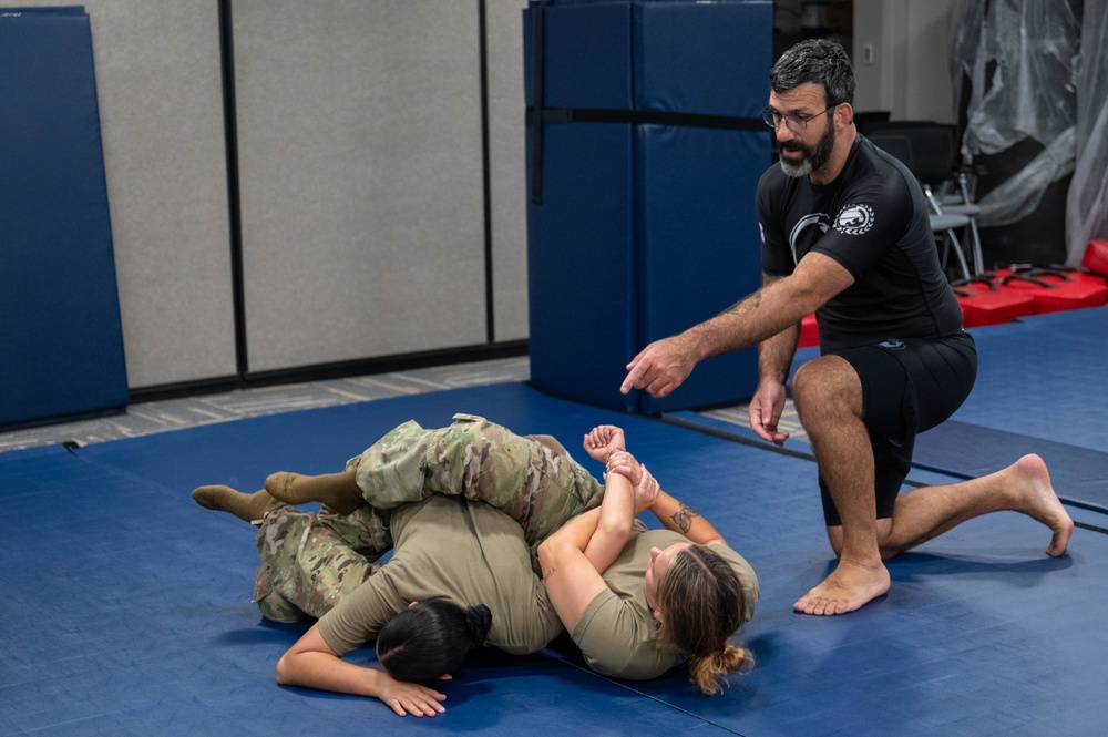 Rescue defenders grapple with combatives