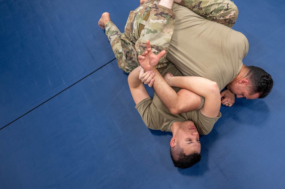 Rescue defenders grapple with combatives