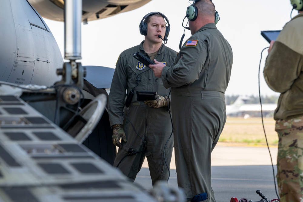 728th Airlift Squadron members conduct specialized fueling operation