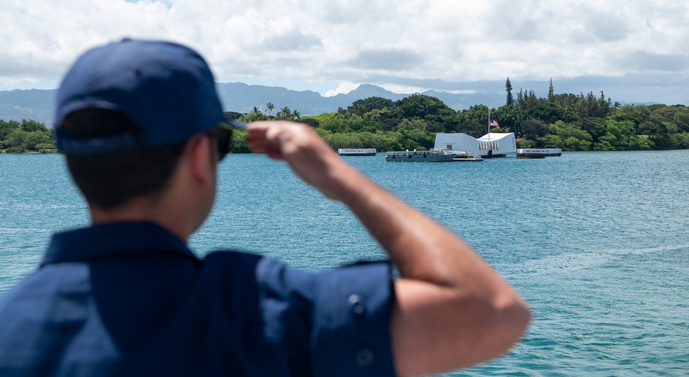 U.S. Coast Guard Cutter Stratton crew members prepare to depart Honolulu