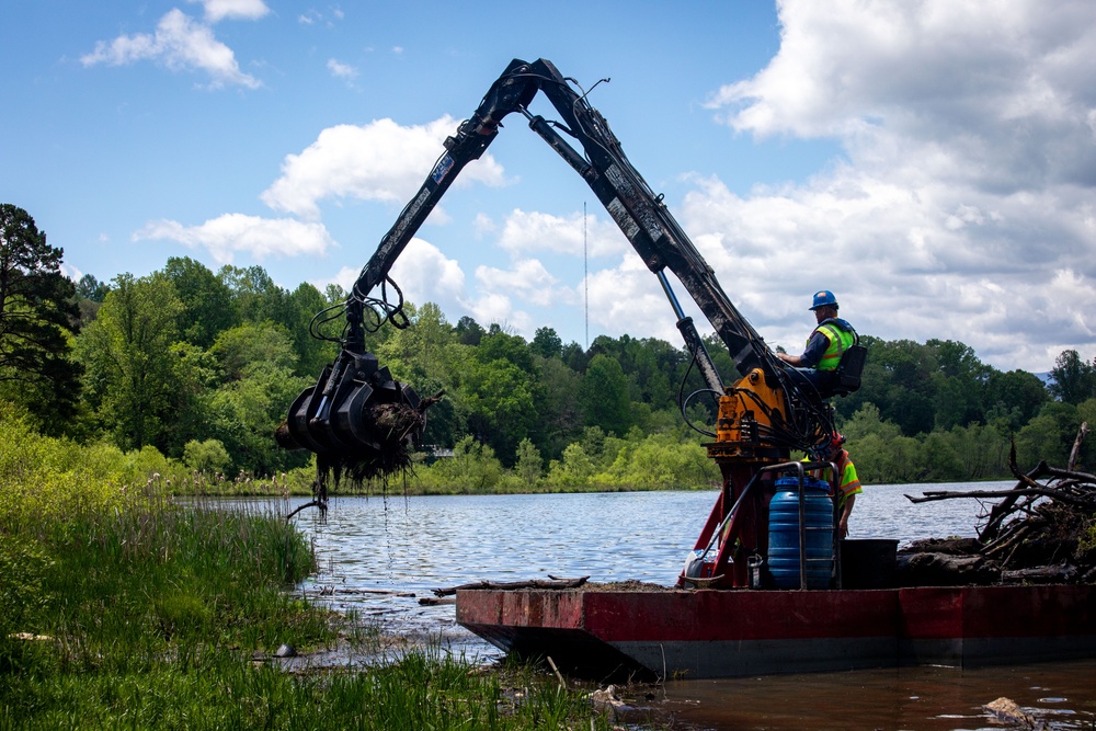 Barges remove hurricane Helene debris at Lake Emery