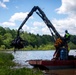 Barges remove hurricane Helene debris at Lake Emery