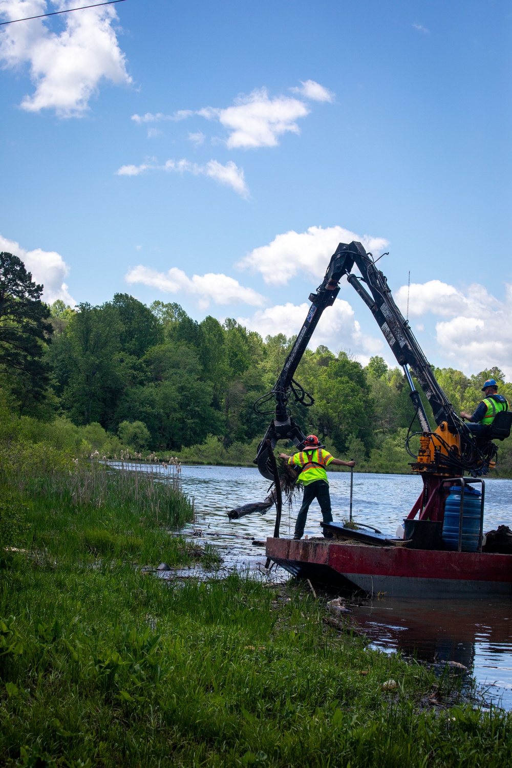 Barges remove hurricane Helene debris at Lake Emery