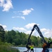 Barges remove hurricane Helene debris at Lake Emery