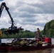 Barges remove hurricane Helene debris at Lake Emery