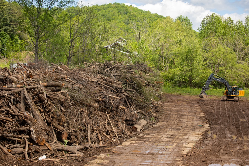 Barges remove hurricane Helene debris at Lake Emery