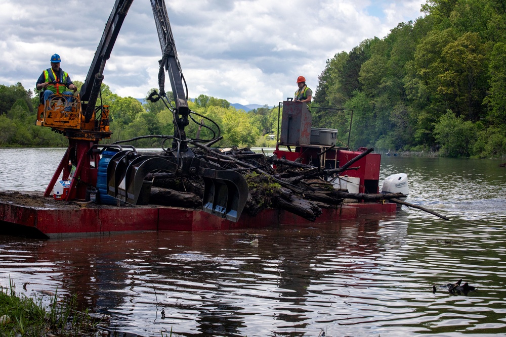 Barges remove hurricane Helene debris at Lake Emery