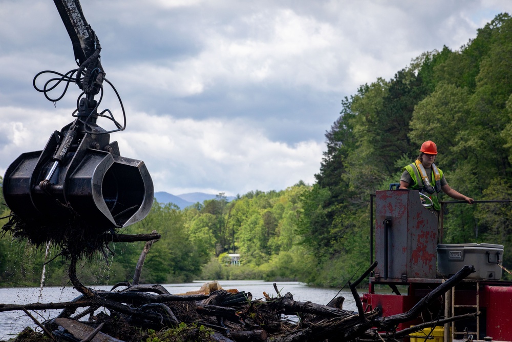 Barges remove hurricane Helene debris at Lake Emery