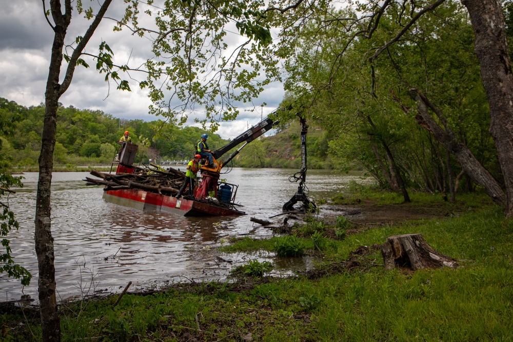 Barges remove hurricane Helene debris at Lake Emery