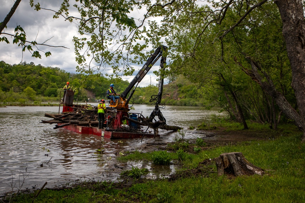 Barges remove hurricane Helene debris at Lake Emery