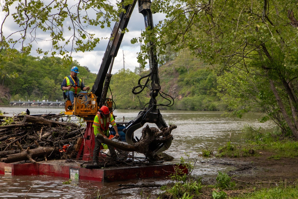 Barges remove hurricane Helene debris at Lake Emery