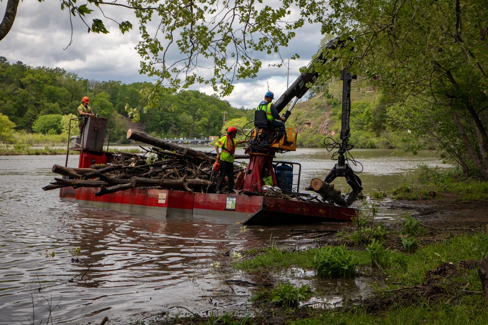 Barges remove hurricane Helene debris at Lake Emery