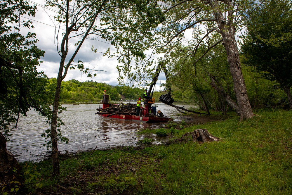 Barges remove hurricane Helene debris at Lake Emery