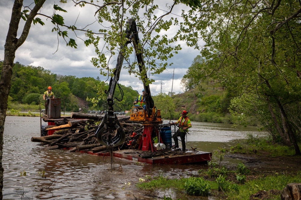 Barges remove hurricane Helene debris at Lake Emery