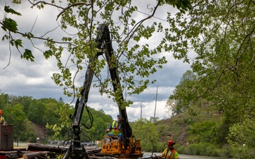 Barges remove hurricane Helene debris at Lake Emery