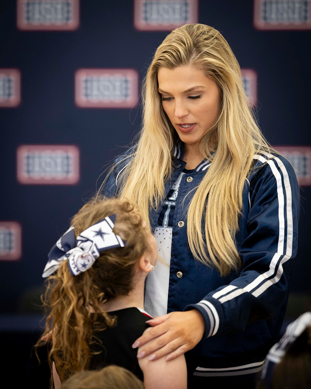 Dallas Cowboys Cheerleaders visit USAG Rheinland-Pfalz to celebrate Month of the Military Child