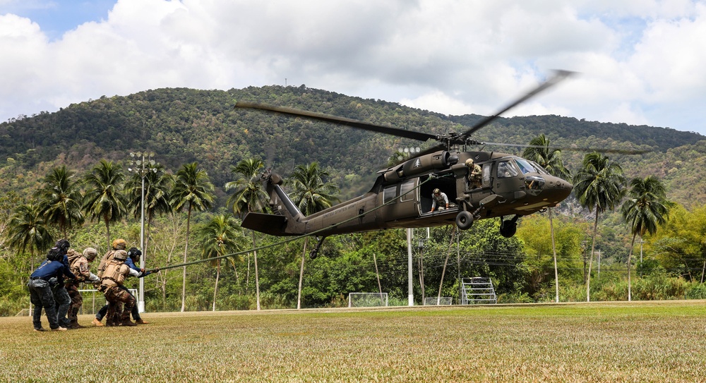 Multinational special operations forces conduct fast-rope insertion training during TRADEWINDS 25