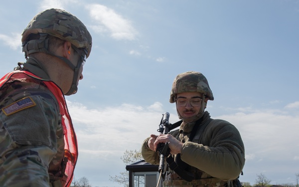 U.S. Army Spc. Trevor Seiler has his M4 carbine cleared