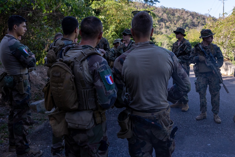 Multinational forces participate in jungle patrol training during TRADEWINDS 25